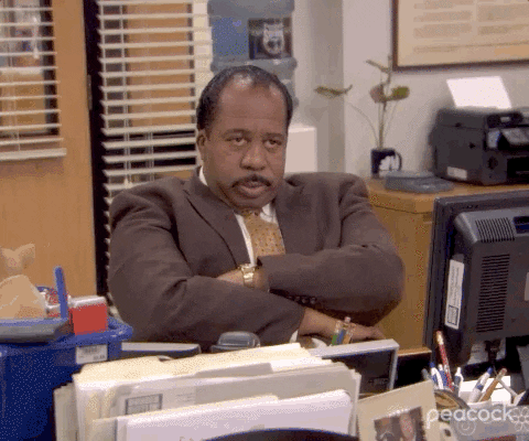 Questa GIF è di The Office Un personaggio di The Office si annoia parecchio